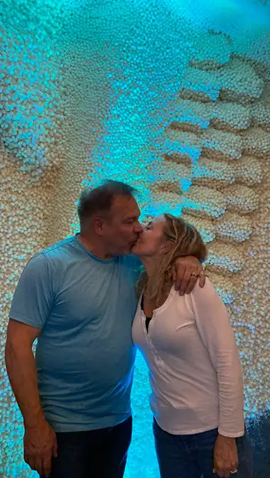 Capturing this anniversary couple's salty kiss.